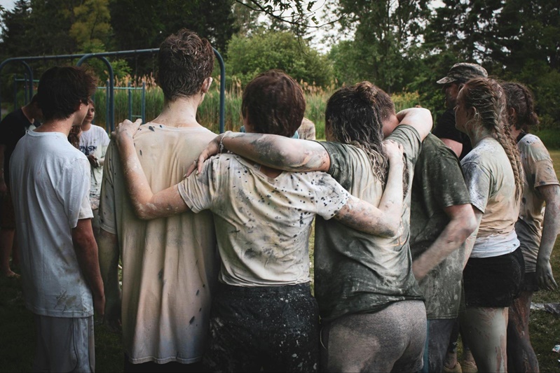 children huddled in a circle